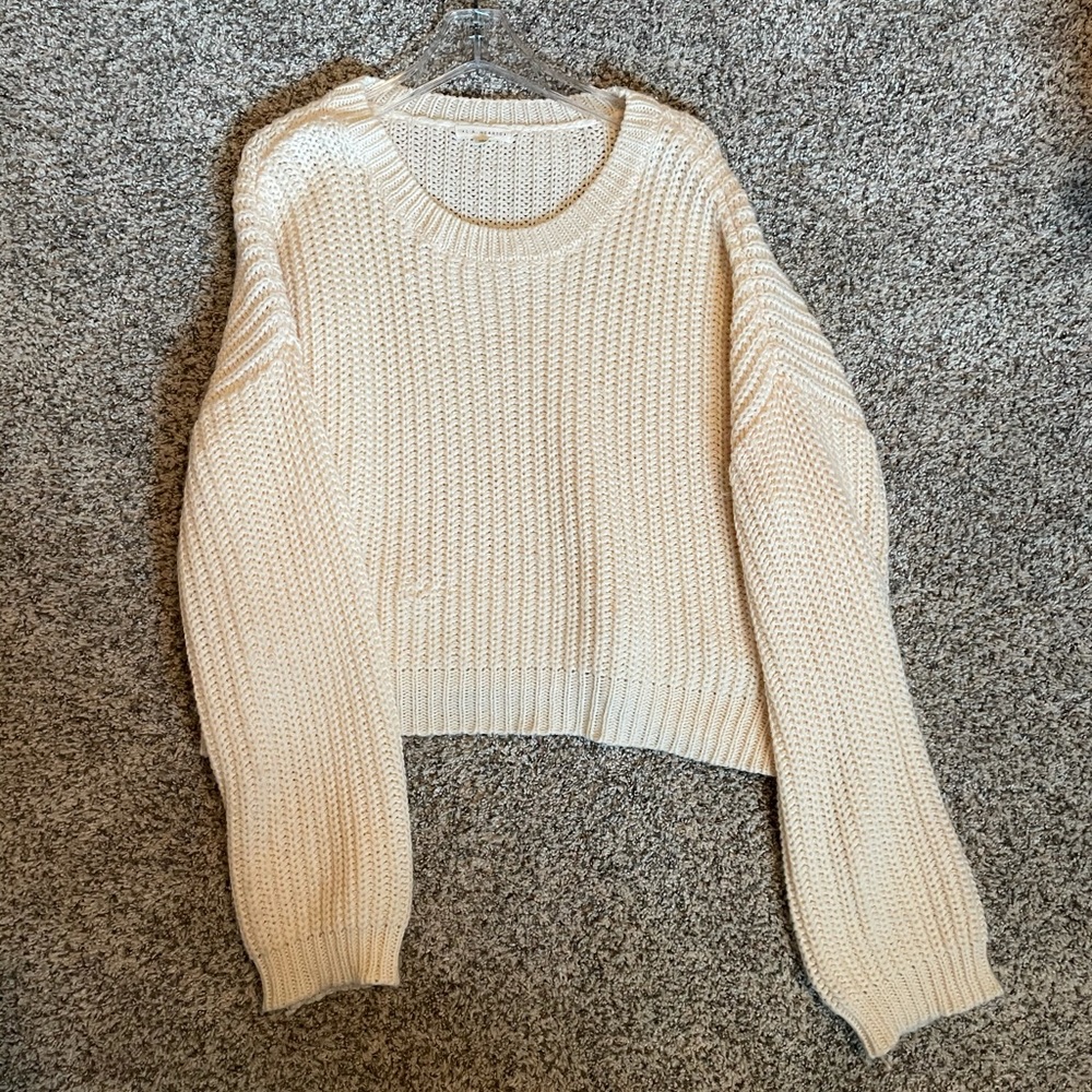 cream sweater